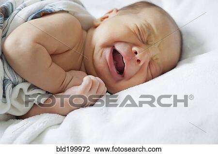 Stock Image - Crying baby boy. Fotosearch