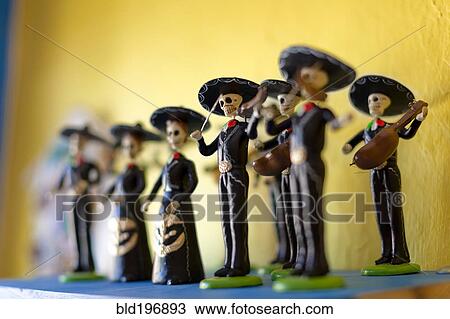 Stock Image - Day of the Dead statuettes. Fotosearch
