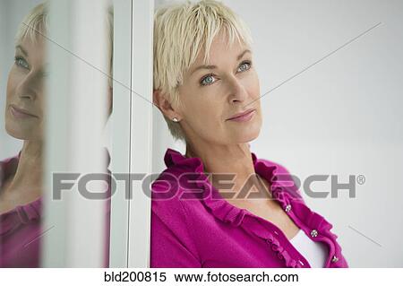 Stock Photography - Daydreaming Caucasian woman. Fotosearch