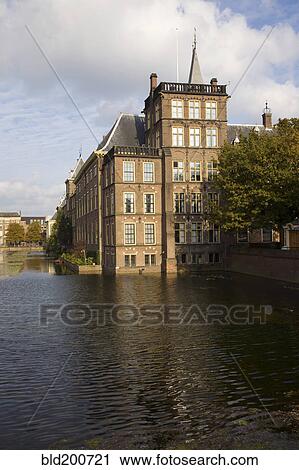 Stock Image - Dutch building on pond. Fotosearch