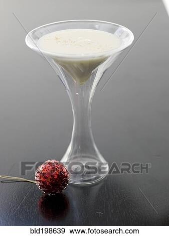 Eggnog in futuristic glass View Large Photo Image Stock Photo - Eggnog in futuristic glass. Fotosearch