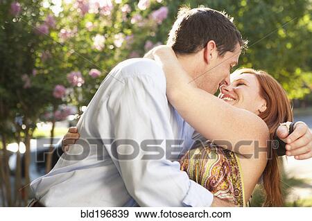 Elegant Caucasian couple hugging View Large Photo Image Stock Photo - Elegant Caucasian couple hugging. Fotosearch