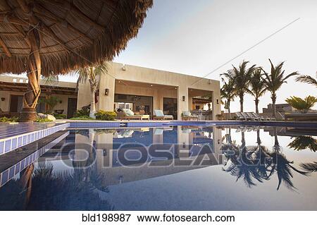 Elegant home and swimming pool View Large Photo Image Stock Photo - Elegant home and swimming pool. Fotosearch