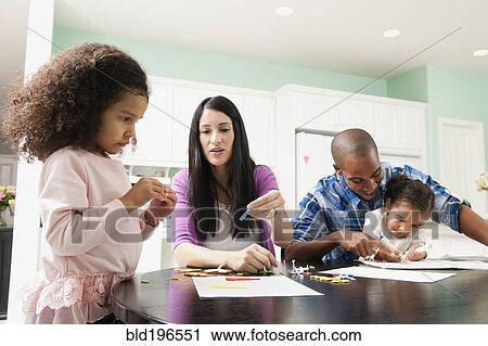 Family doing arts and crafts together View Large Photo Image Stock Image - Family doing arts and crafts together. Fotosearch