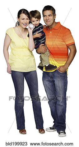 Stock Image - Family using telephone together. Fotosearch