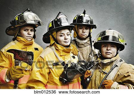 Stock Photograph - Firefighters in protective clothing. Fotosearch