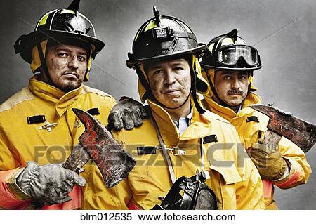 Stock Photography - Firefighters in protective clothing. Fotosearch