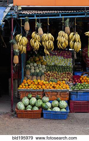 Stock Photo - Fresh fruit in Indian vegetable market. Fotosearch