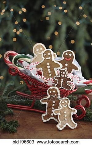 Gingerbread man cookies in sleigh View Large Photo Image Stock Image - Gingerbread man cookies in sleigh. Fotosearch