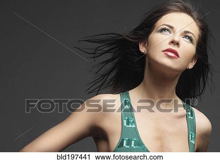 Stock Image - Glamorous mixed race woman. Fotosearch