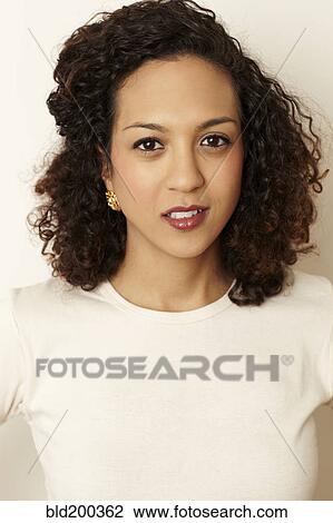 Stock Image - Glamorous mixed race woman. Fotosearch