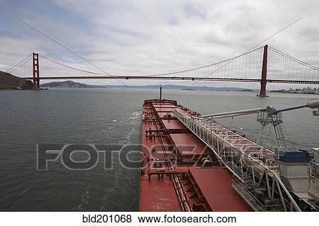 Golden Gate Bridge and freight ship View Large Photo Image Stock Photo - Golden Gate Bridge and freight ship. Fotosearch