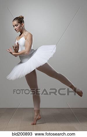 Graceful ballet dancer in tutu View Large Photo Image Stock Image - Graceful ballet dancer in tutu. Fotosearch