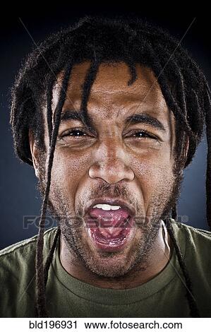 Grimacing Black man View Large Photo Image Stock Image - Grimacing Black man. Fotosearch