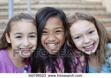 Stock Image - Grinning friends. Fotosearch