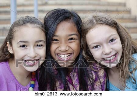 Grinning friends View Large Photo Image Stock Image - Grinning friends. Fotosearch