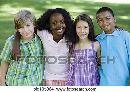 Picture - Happy children hugging. Fotosearch