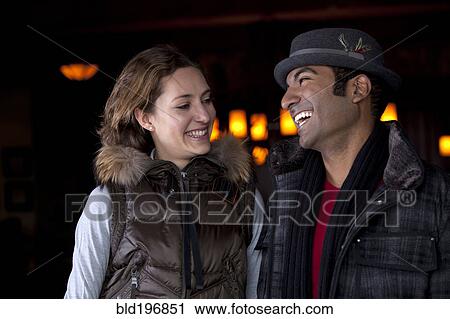 Happy couple laughing View Large Photo Image Stock Image - Happy couple laughing. Fotosearch