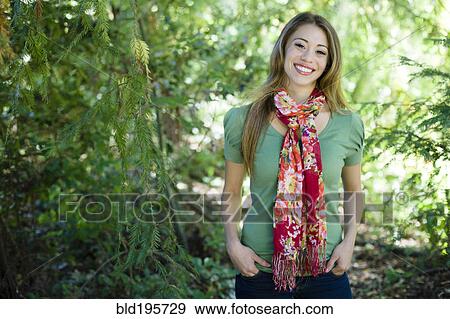 Stock Photo - Hispanic woman in colorful scarf. Fotosearch