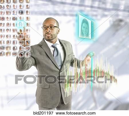 Stock Photo - Images of business people floating in front of African American businessman. Fotosearch