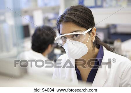 Picture - Indian scientist working in laboratory. Fotosearch