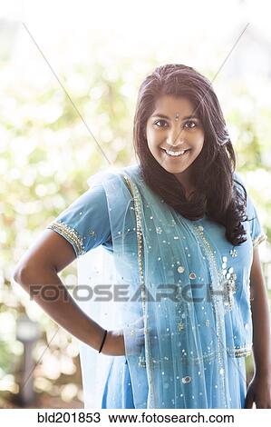 Stock Image - Indian woman in traditional clothing. Fotosearch