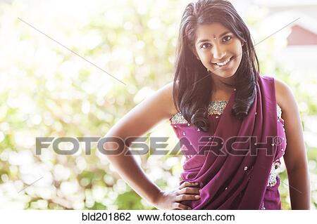 Indian woman in traditional clothing View Large Photo Image Stock Image - Indian woman in traditional clothing. Fotosearch