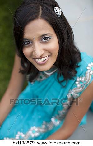 Stock Photo - Indian woman in traditional clothing. Fotosearch