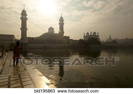 Stock Image - Lake and Golden Temple. Fotosearch