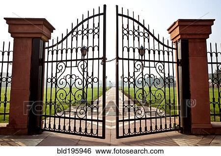 Large iron gates secured with padlock View Large Photo Image Stock Photograph - Large iron gates secured with padlock. Fotosearch