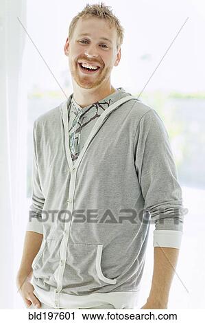 Stock Image - Laughing Caucasian man. Fotosearch