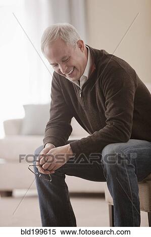Stock Photography - Laughing Caucasian man. Fotosearch