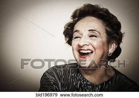 Laughing senior woman View Large Photo Image Stock Photo - Laughing senior woman. Fotosearch