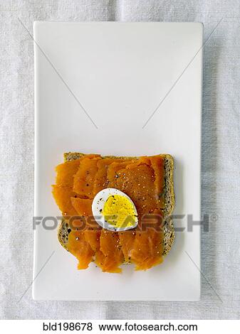 Lox and hard boiled egg on bread View Large Photo Image Stock Photo - Lox and hard boiled egg on bread. Fotosearch