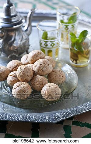 Macaroons and tea on tray View Large Photo Image Stock Image - Macaroons and tea on tray. Fotosearch