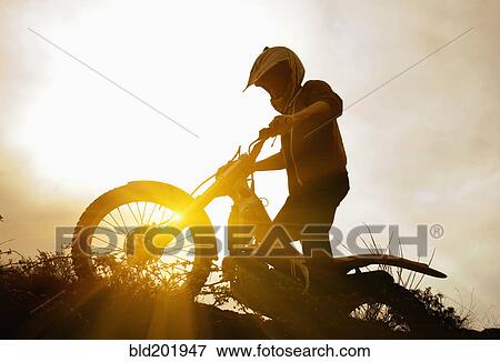 Stock Photo - Man riding motorcycle. Fotosearch