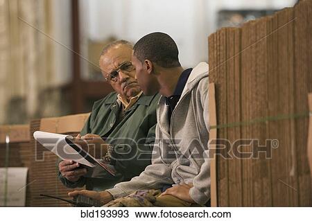 Manager questioning worker in warehouse View Large Photo Image Stock Image - Manager questioning worker in warehouse. Fotosearch