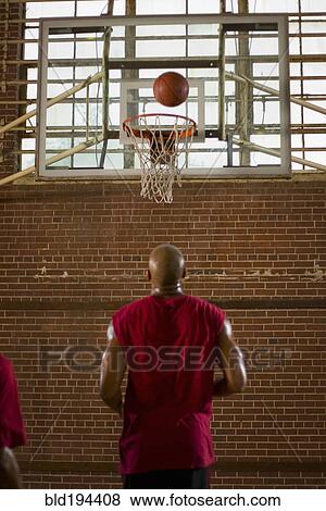 Men playing basketball View Large Photo Image Stock Photo - Men playing basketball. Fotosearch
