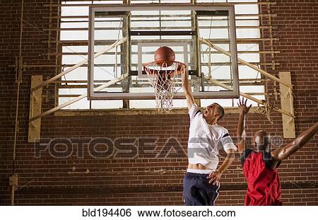 Men playing basketball View Large Photo Image Stock Photograph - Men playing basketball. Fotosearch