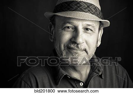 Stock Image - Middle Eastern man in hat. Fotosearch