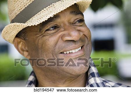 Mixed race man in hat View Large Photo Image Stock Photo - Mixed race man in hat. Fotosearch