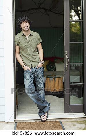Mixed race man leaning in doorway View Large Photo Image Stock Photography - Mixed race man leaning in doorway. Fotosearch