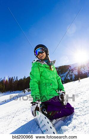 Mixed race teenager snowboarding View Large Photo Image Stock Photograph - Mixed race teenager snowboarding. Fotosearch