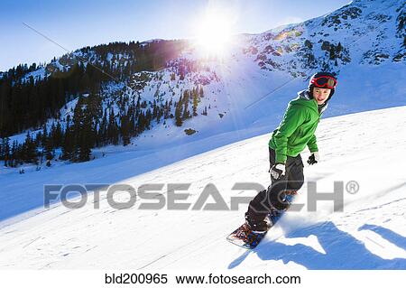 Mixed race teenager snowboarding View Large Photo Image Stock Photography - Mixed race teenager snowboarding. Fotosearch