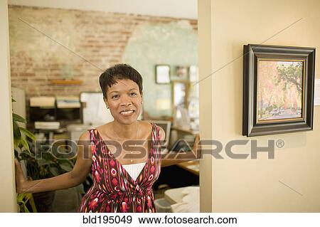Mixed race woman standing in doorway View Large Photo Image Stock Photo - Mixed race woman standing in doorway. Fotosearch