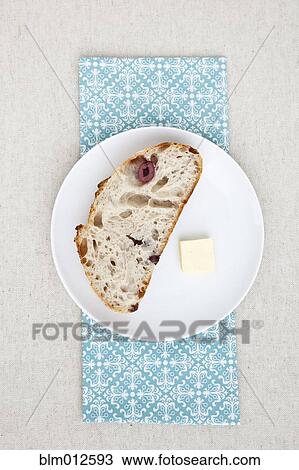 Olive bread and butter on plate View Large Photo Image Stock Image - Olive bread and butter on plate. Fotosearch