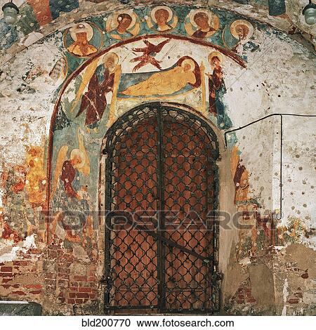 Stock Image - Paintings over arched door. Fotosearch