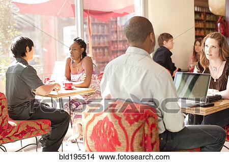 People at tables in cafe View Large Photo Image Picture - People at tables in cafe. Fotosearch