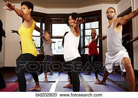 People practicing yoga in class View Large Photo Image Stock Image - People practicing yoga in class. Fotosearch