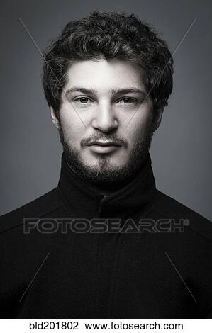Stock Image - Portrait of serious man. Fotosearch